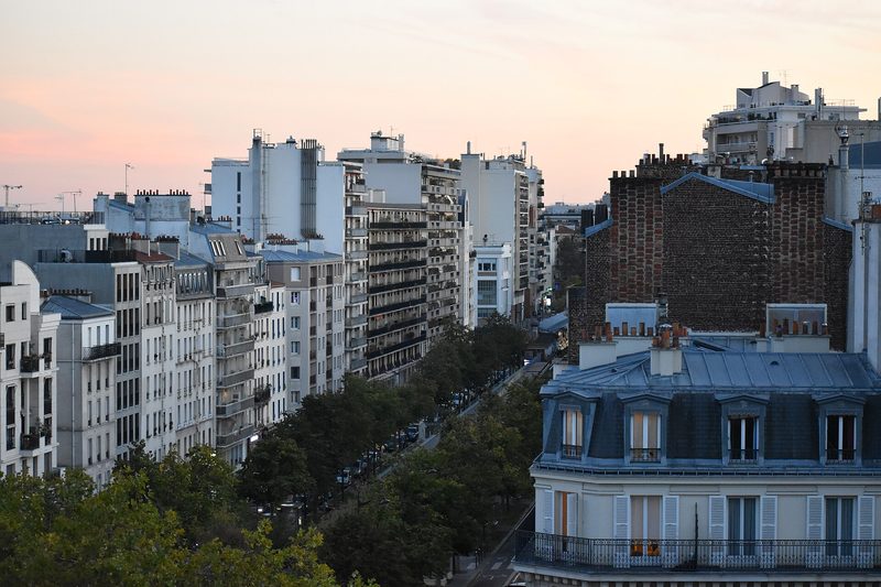 Rooftops and upper floors of Paris apartment buildings seen from above
