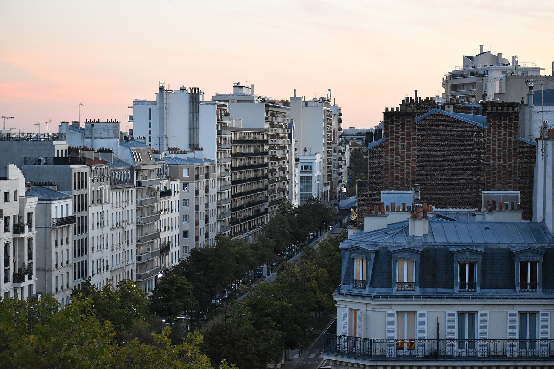 Rooftops and upper floors of Paris apartment buildings seen from above